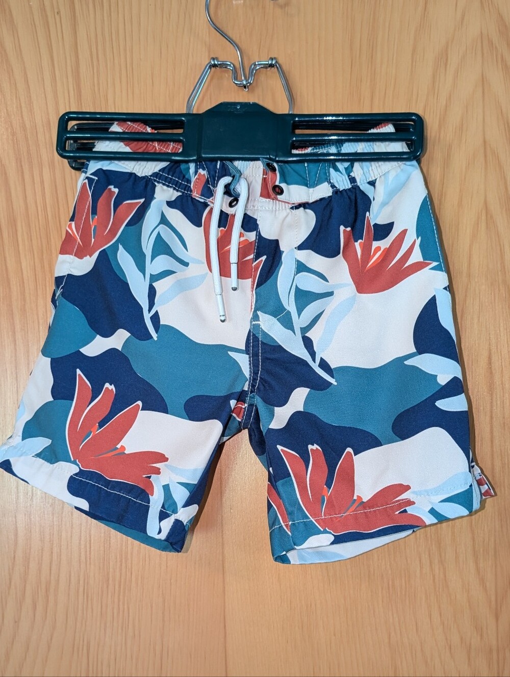 Boys Blue Floral Swim Shorts with Red Accents